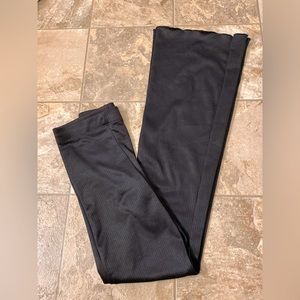 divided black H&M flare pants.